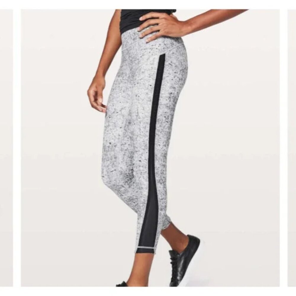 Gray lululemon leggings with black stripped side